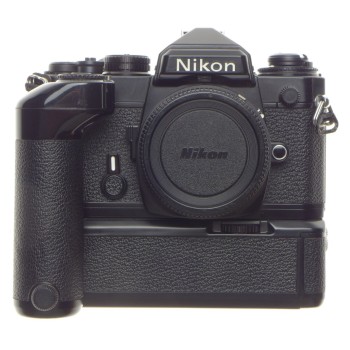 Black NIKON FE 35mm SLR classic film camera body with MD-12 motor winder hand battery grip