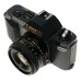 Canon T50 SLR antique camera FD 1.8/50 takes 35mm film