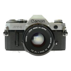 Canon AT-1 35mm film SLR camera FD 1:1.8 50mm lens filter cap shade hood