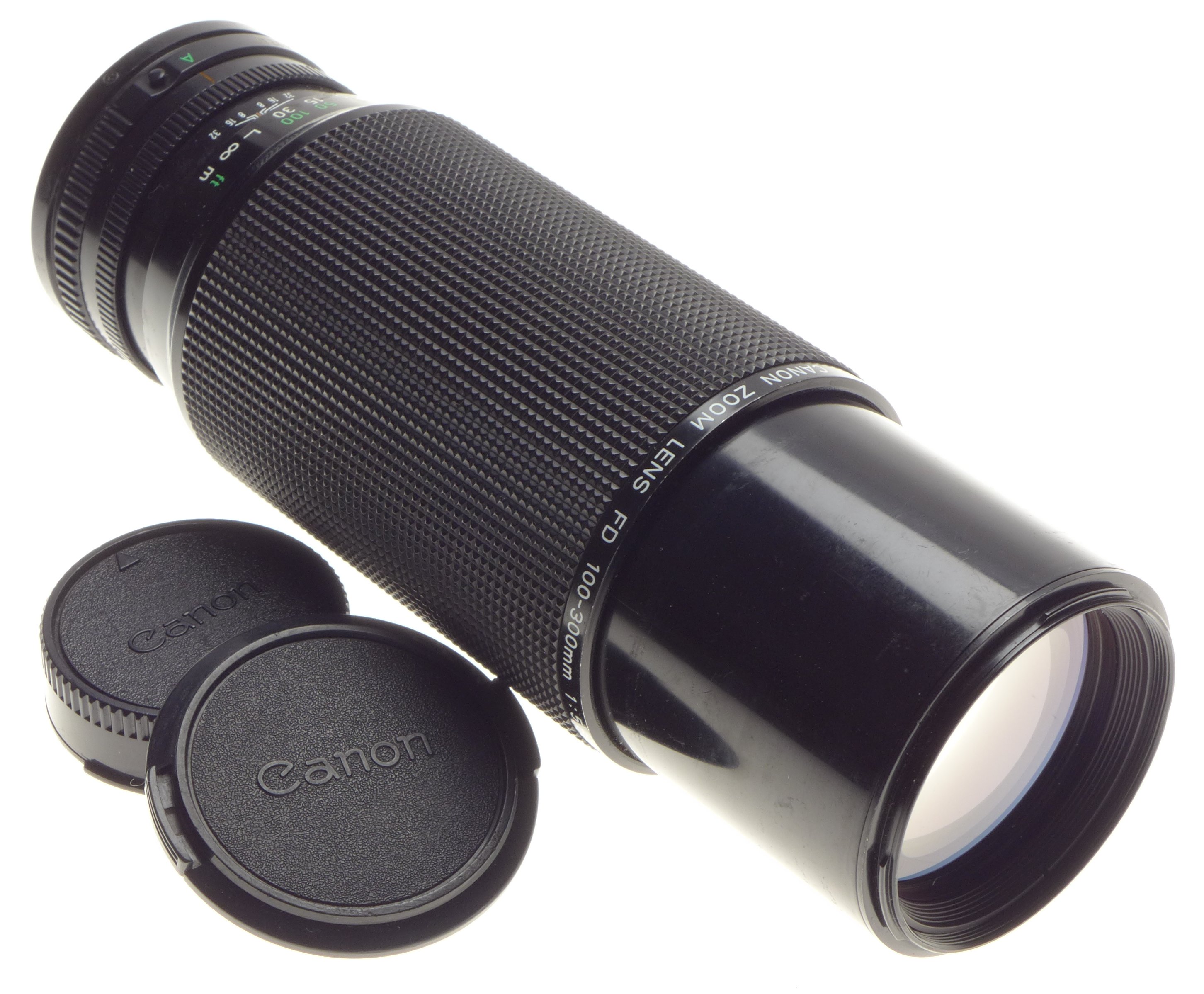 35mm Point & Shoot Canon FD Zoom lens 100300mm 15.6 caps for SLR